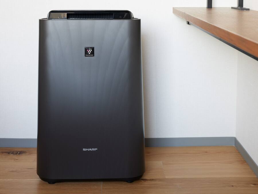 A black, ribbed, rectangular appliance with a control panel and the brand name 'SHARP' visible on the front.