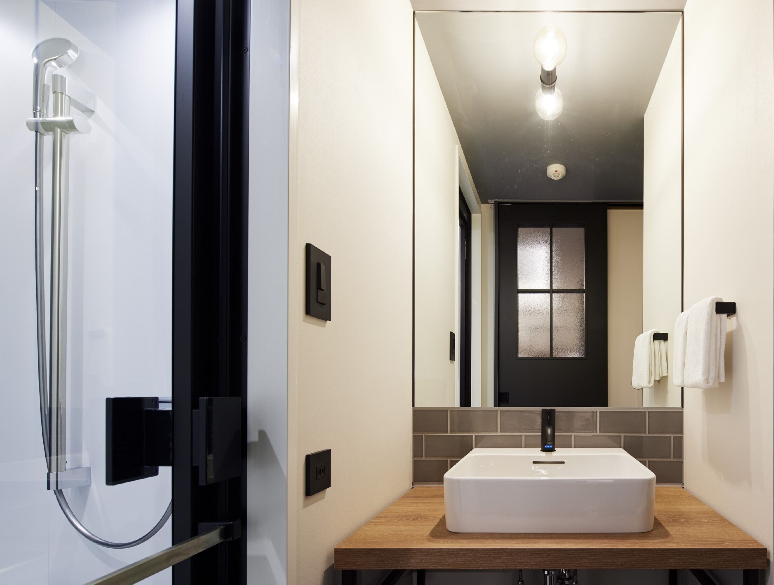 separate bathtub and shower, free toiletries, hair dryer, slippers