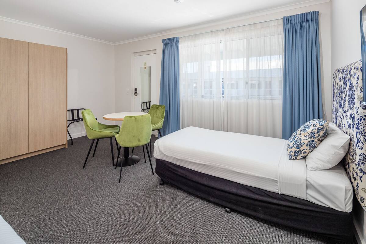 twin room | premium bedding, blackout curtains, iron/ironing board, free wifi