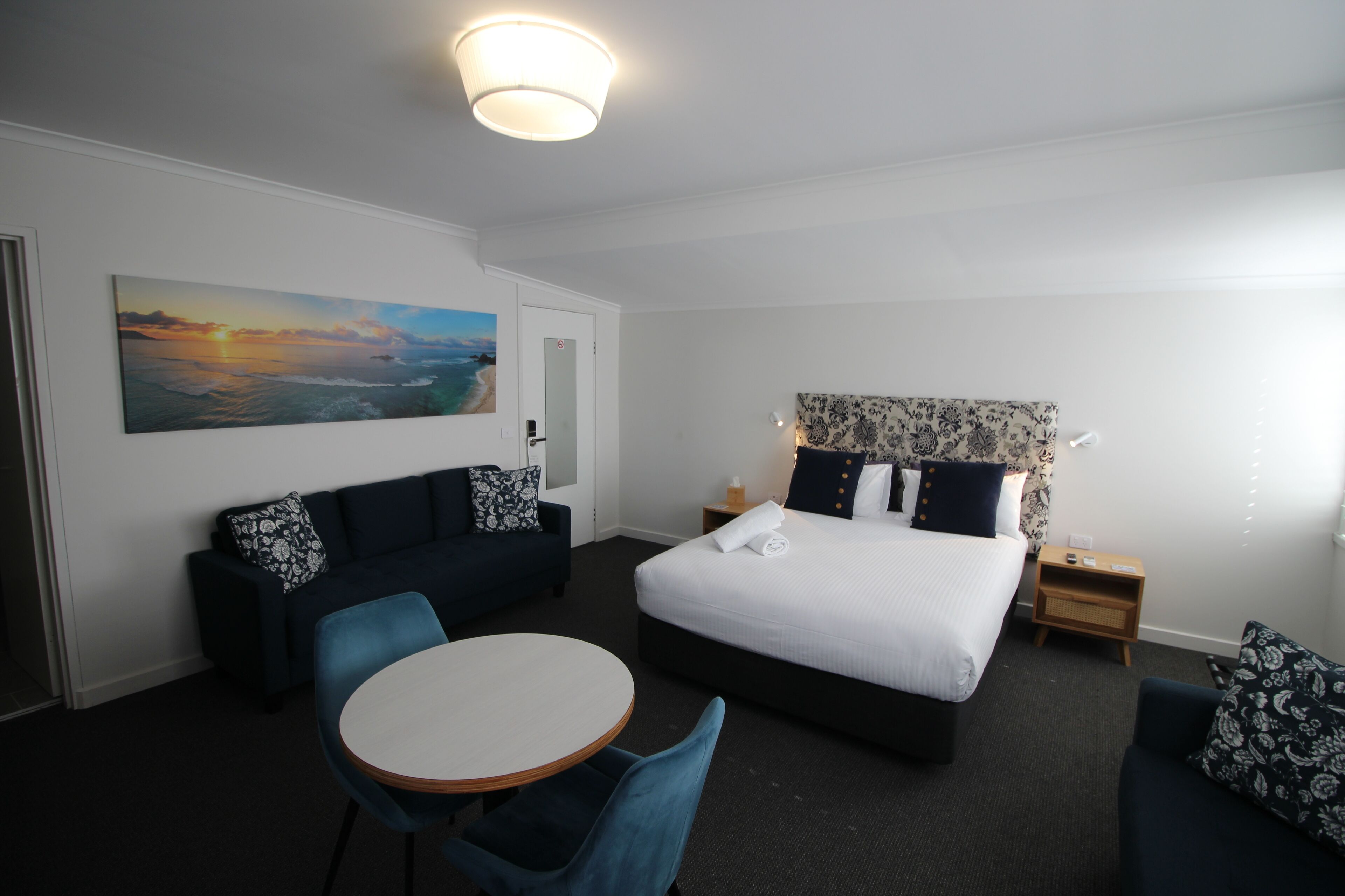 Riverview Suite | Premium bedding, blackout drapes, iron/ironing board, free WiFi