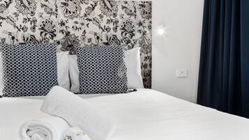 Family Apartment | Premium bedding, blackout curtains, iron/ironing board, free WiFi