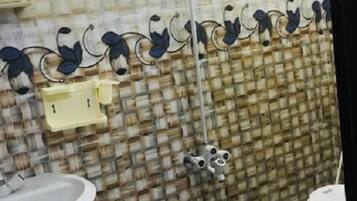 Standard Double Room | Bathroom | Shower, free toiletries, slippers, towels