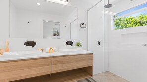 Shower, hair dryer, towels, soap