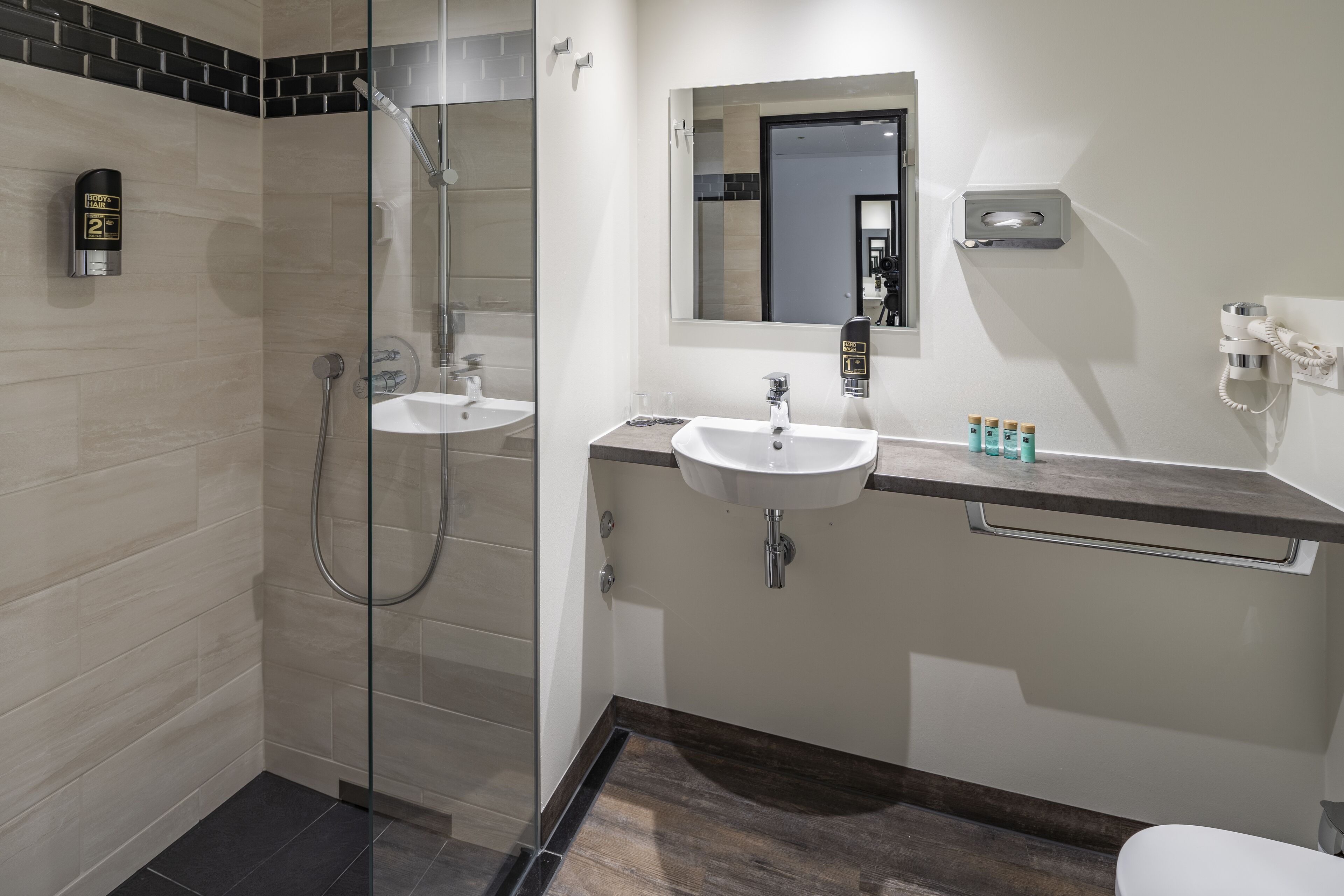 junior double room | bathroom | shower, hair dryer, towels, soap