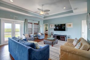 TV - This spacious home has sophisticated beach decor, adding to the welcoming feel t (Port Aransas)