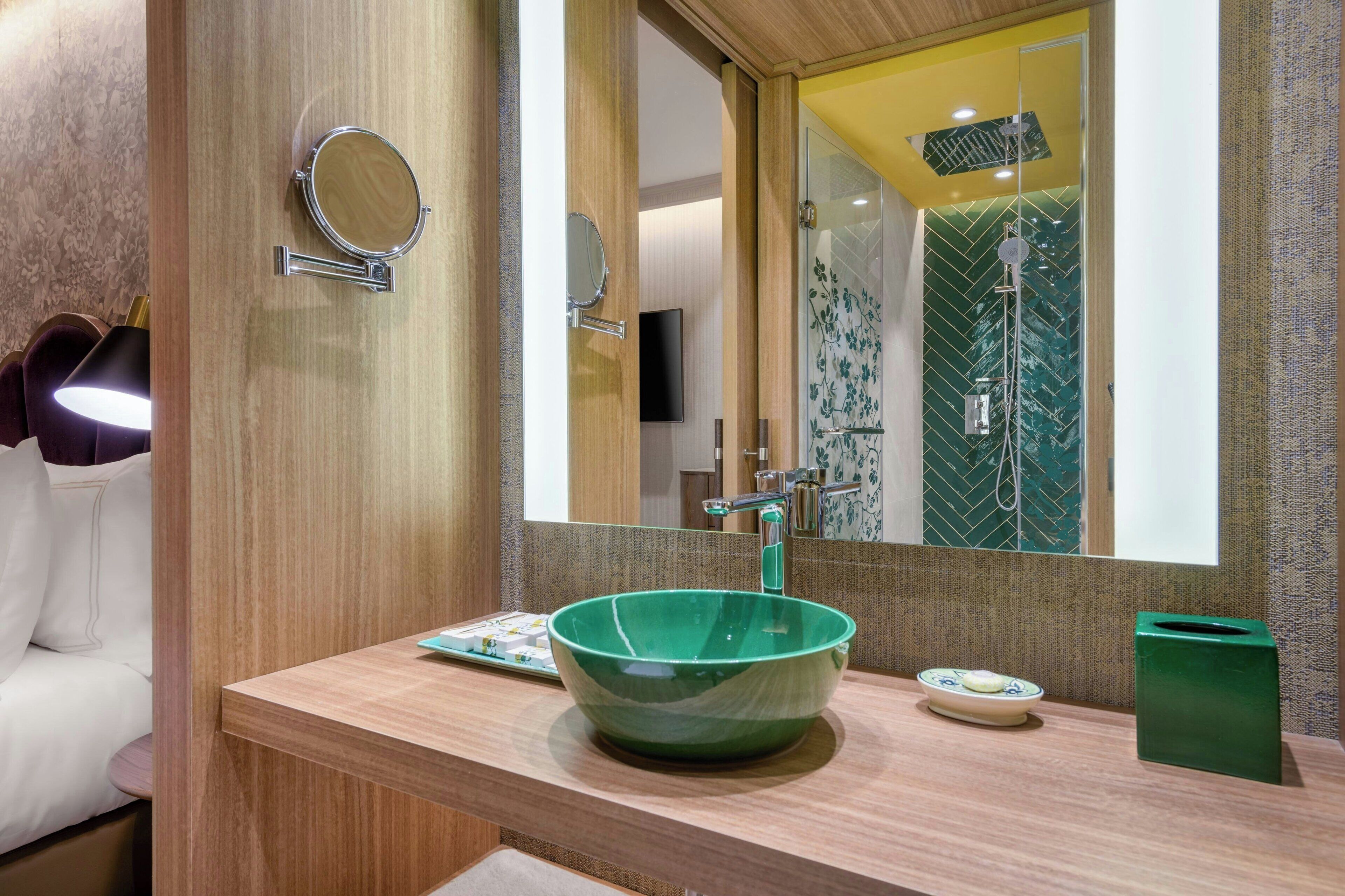 rainfall showerhead, designer toiletries, hair dryer, bathrobes