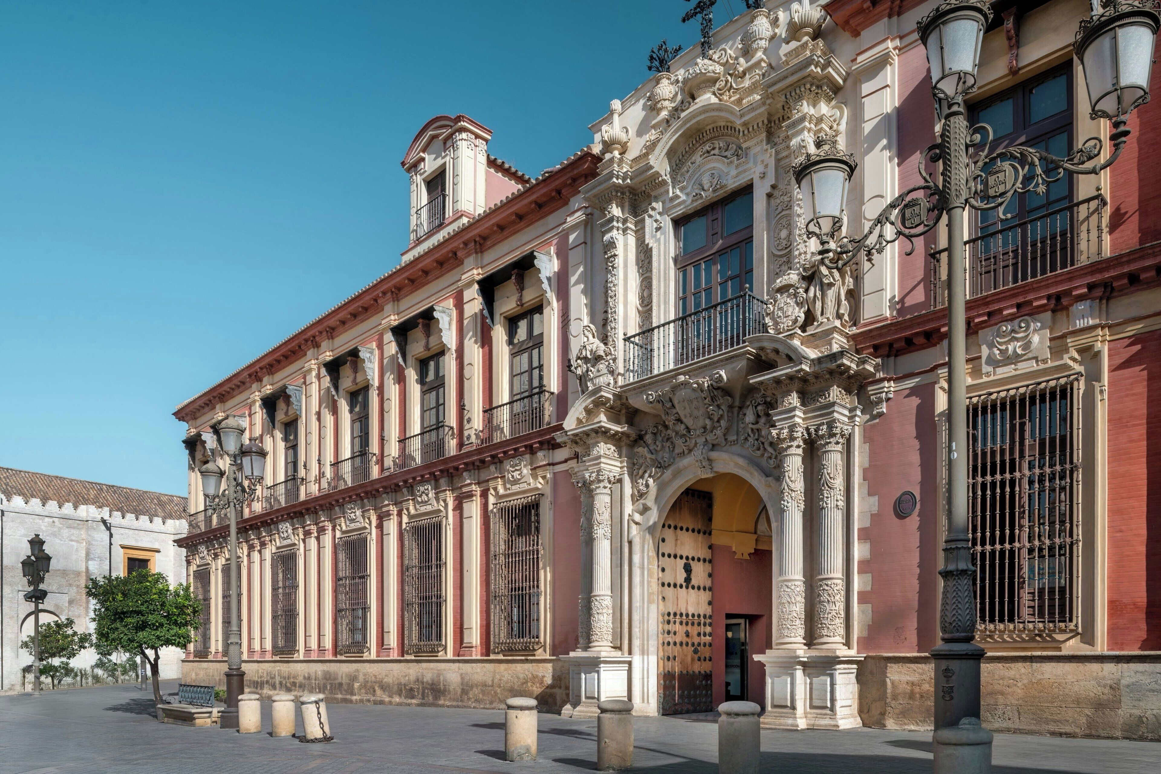 A historic building with ornate architectural details, including columns and decorative elements.