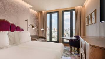 Hypo-allergenic bedding, pillow-top beds, minibar, in-room safe