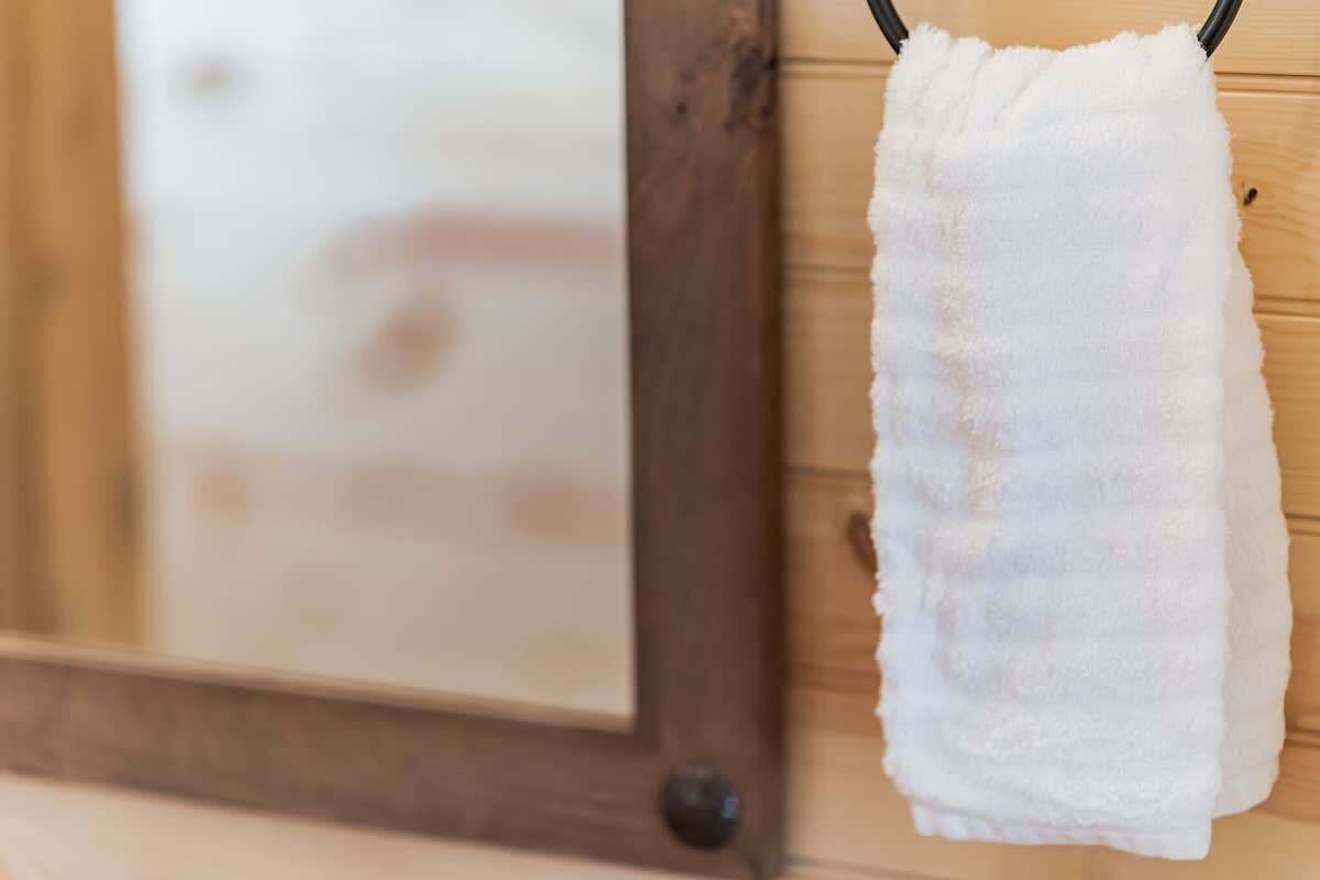 Shower, hair dryer, towels, shampoo