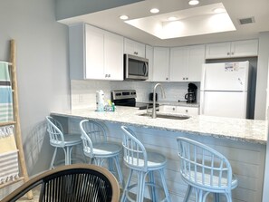 Fridge, microwave, stovetop, dishwasher - Sweeping views of the Lagoon from 3 bedroom / 2 bath condo (Gulf Shores)