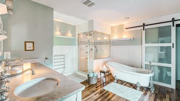 Combined shower/tub, hair dryer, towels, soap
