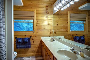 Combined shower/bathtub, towels, soap, shampoo