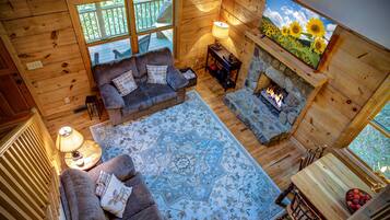 Smart TV, lareira, DVD player, mesa de pingue-pongue