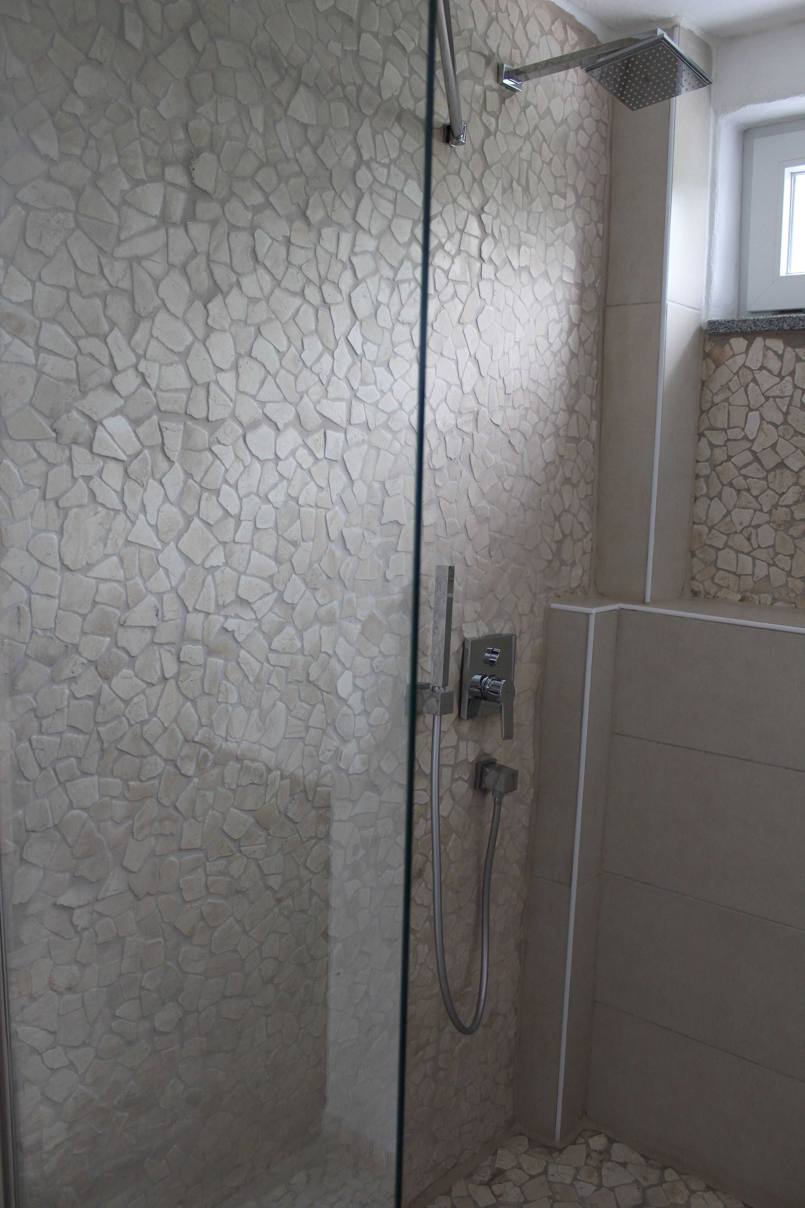 Bathtub, hair dryer, towels, soap