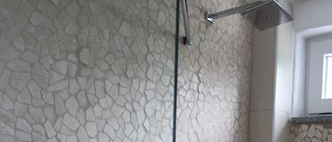 Bathtub, hair dryer, towels, soap