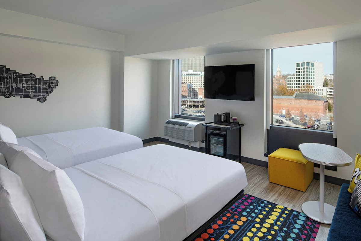 Hypo-allergenic bedding, pillowtop beds, in-room safe, desk