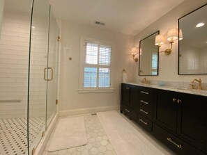 Combined shower/tub, hair dryer, towels, soap