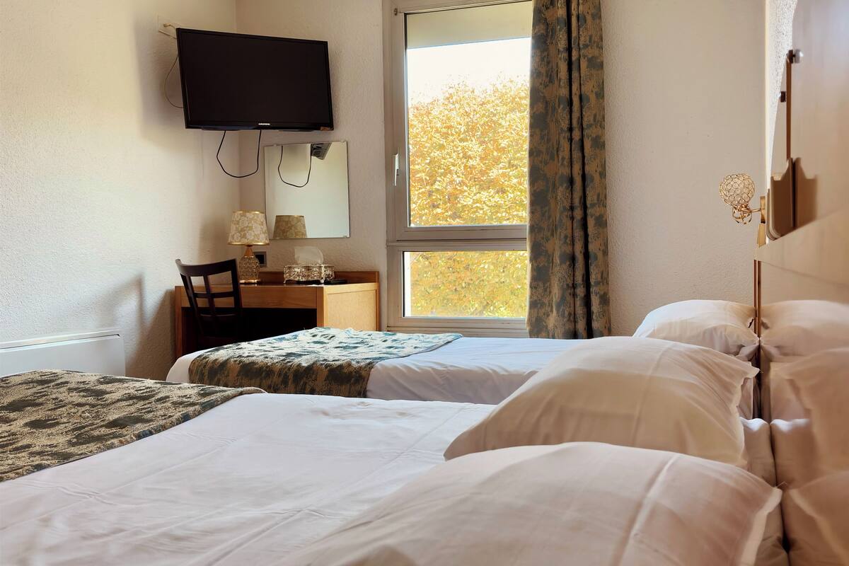 Triple Room, Multiple Beds | Premium bedding, in-room safe, desk, laptop workspace