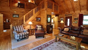 TV connectée, cheminée, lecteur de DVD, table de tennis de table