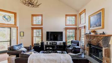 Smart TV, fireplace, foosball, books