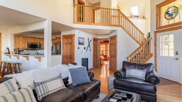 Smart TV, fireplace, foosball, books