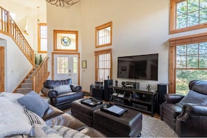 Smart TV, fireplace, table football, books