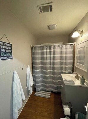 Combined shower/bathtub
