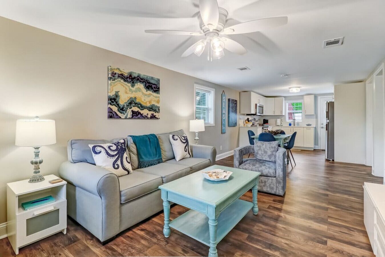 Open concept living room, dining room, and kitchen