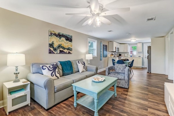 Open concept living room, dining room, and kitchen