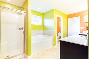 Combined shower/bathtub, hair dryer, towels, soap - Spacious 5BR Retreat Near Fort Liberty & Hospitals (Fayetteville)