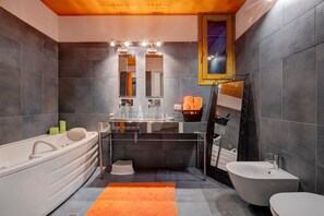 Bathtub, hair dryer, towels