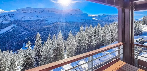 Penthouse T4 haut standing avec cheminées et vue panoramique montagne