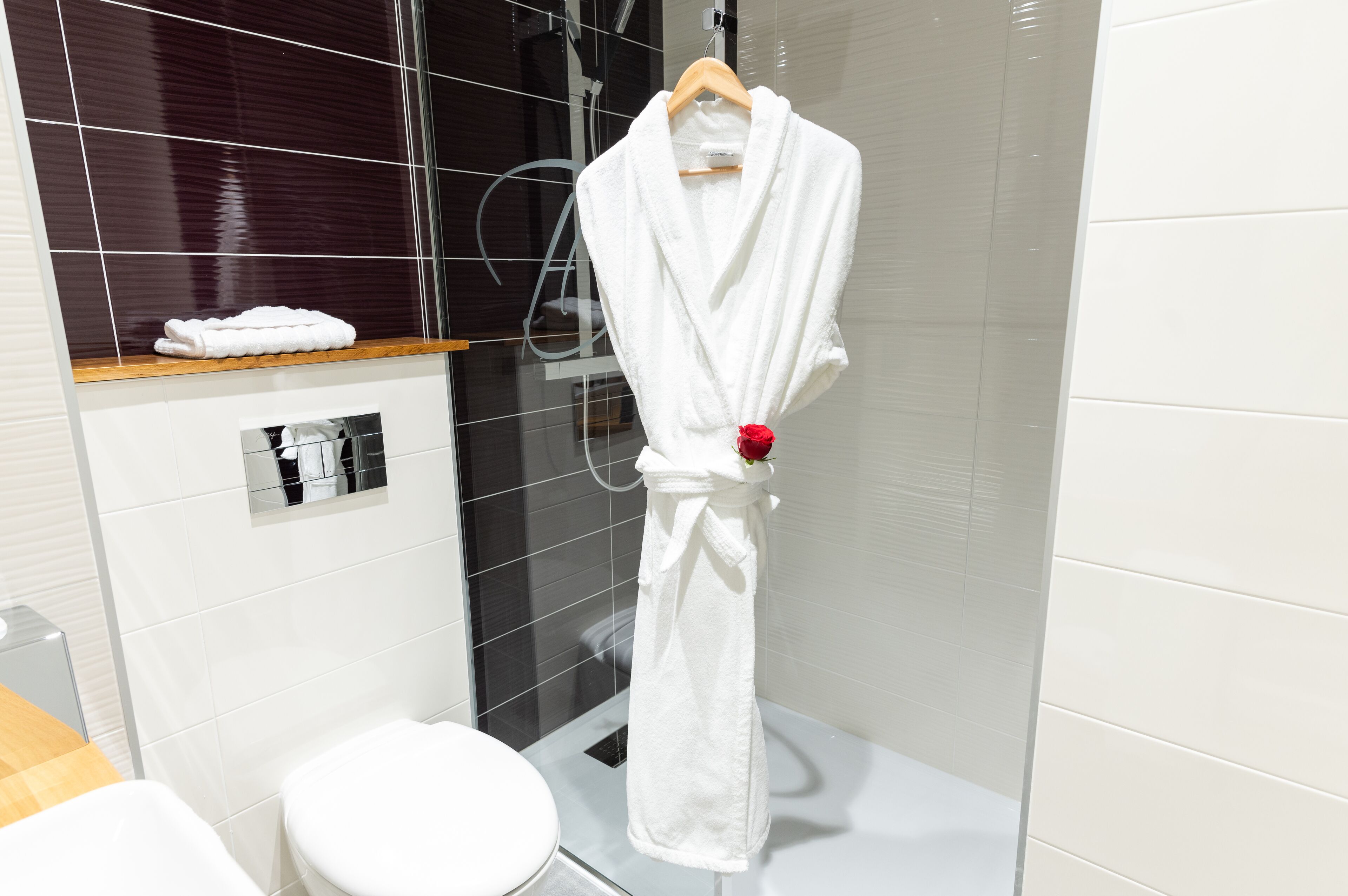 shower, rainfall showerhead, designer toiletries, hair dryer