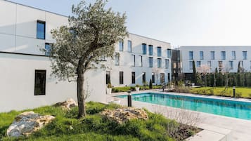 Outdoor pool, open 9:00 AM to 7:00 PM, free pool cabanas, pool umbrellas