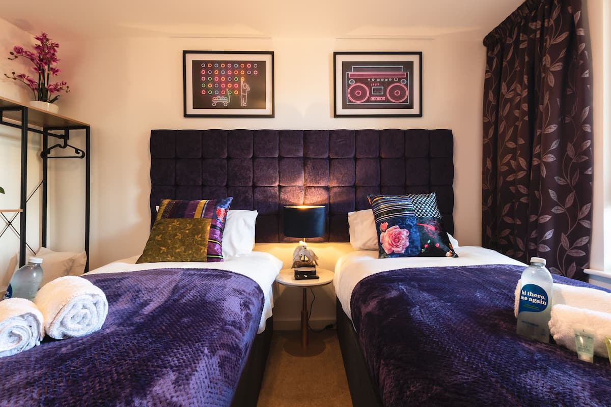 2 bedrooms, premium bedding, pillow-top beds, laptop workspace