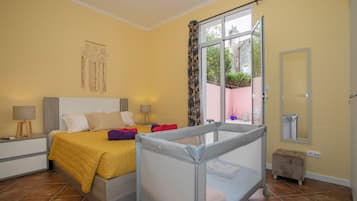 2 bedrooms, desk, iron/ironing board, travel crib