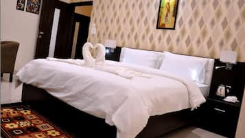 Quarto executivo | Wi-Fi de cortesia, roupa de cama