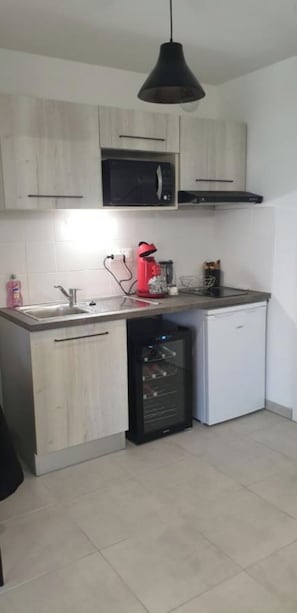 Romantic Apartment | Private kitchen | Fridge, microwave, eco-friendly cleaning products, paper towels