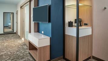 Premium bedding, pillow-top beds, desk, laptop workspace