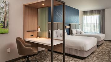 Premium bedding, pillowtop beds, desk, laptop workspace