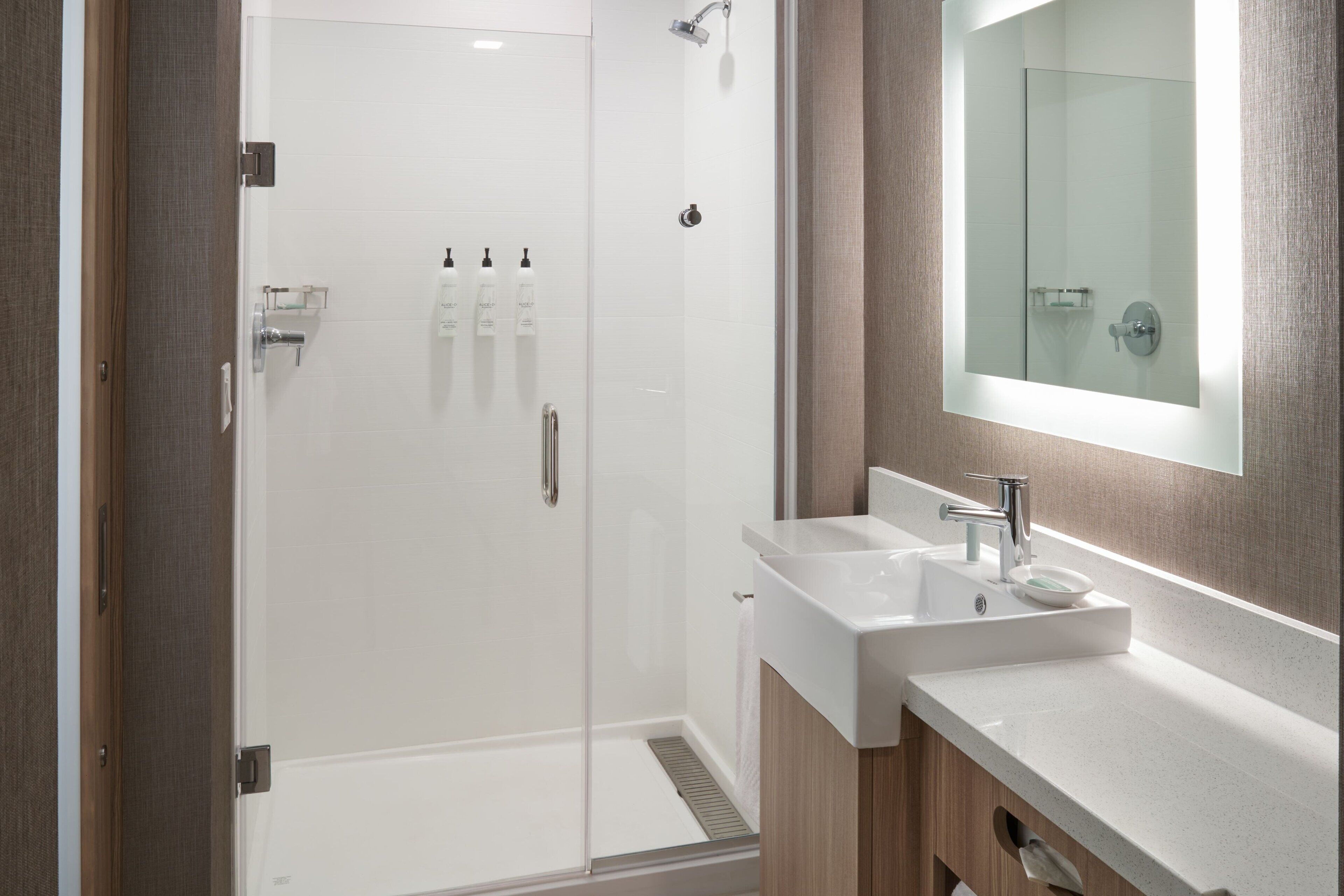 shower, rainfall showerhead, hair dryer, towels