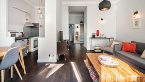 A modern apartment with a kitchen, dining area, and living room. - Stunning apartment in the Gold Square of Nice! (Nice)