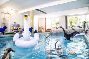 Indoor pool, open 7:00 AM to 10:00 PM, sun loungers