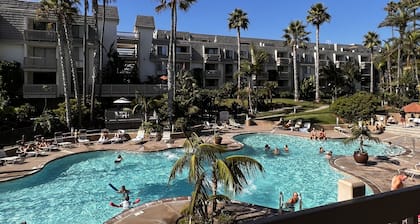 Beautiful End Unit Single Level Condo North Coast Village - Walk to the beach!!