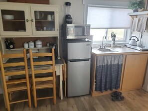 Microwave, coffee/tea maker, cookware/dishes/utensils