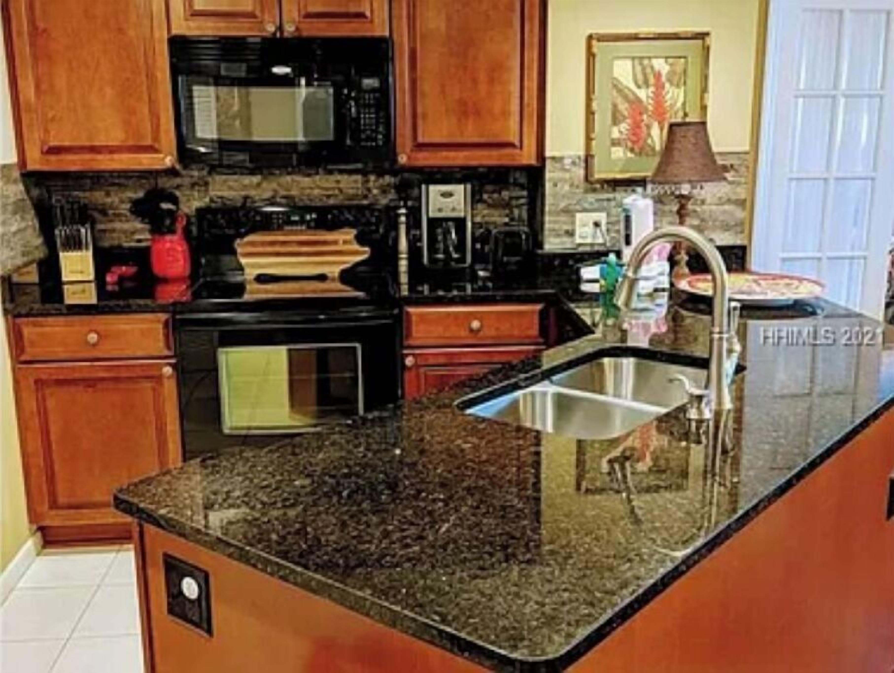 Fridge, microwave, stovetop, cookware/dishes/utensils