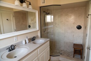 Combined shower/tub, hair dryer, towels, toilet paper