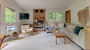 Smart TV, fireplace, books
