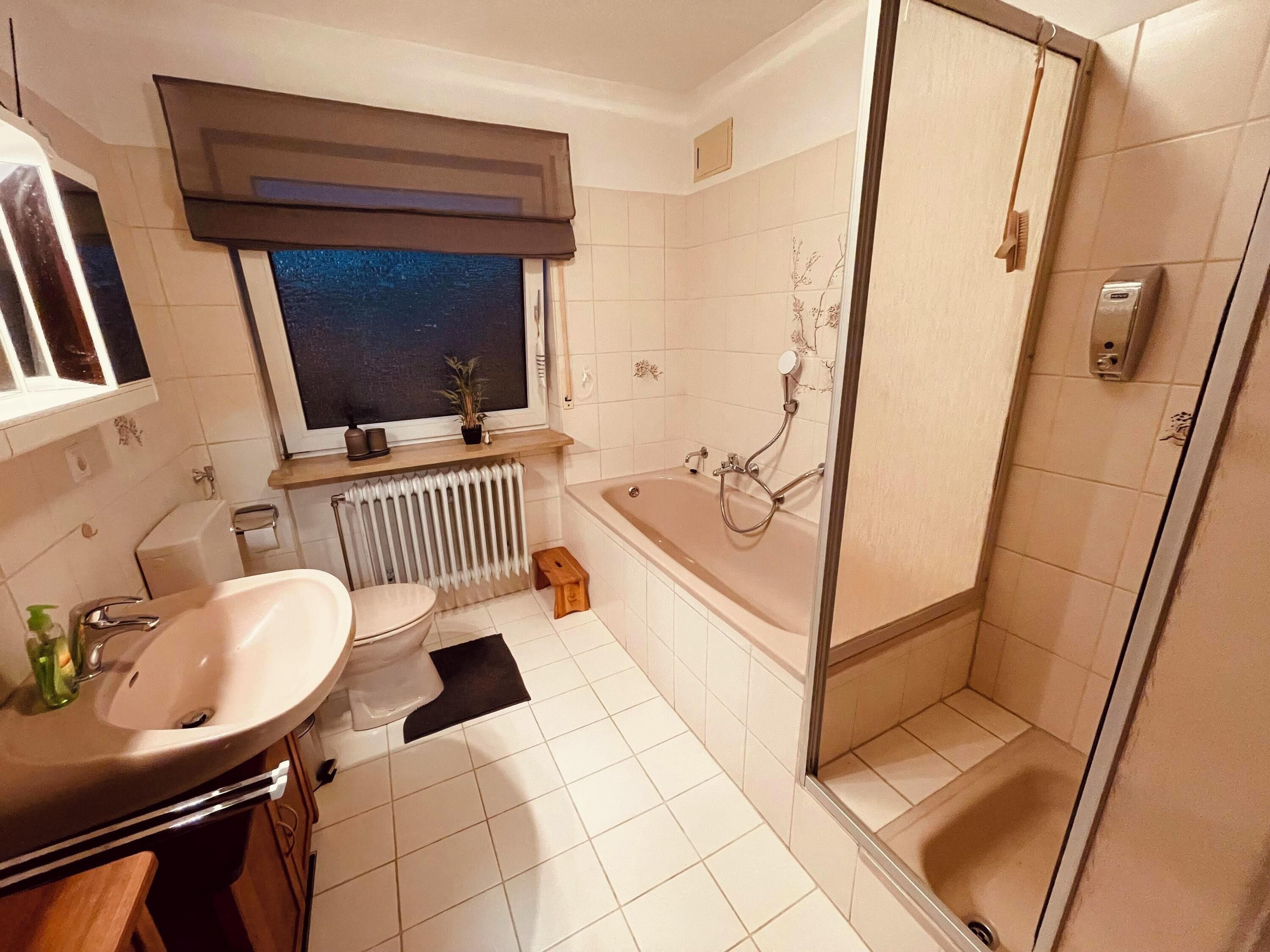 Bathtub, hair dryer, towels