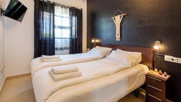 2 slaapkamers, een strijkplank/strijkijzer, gratis wifi, beddengoed